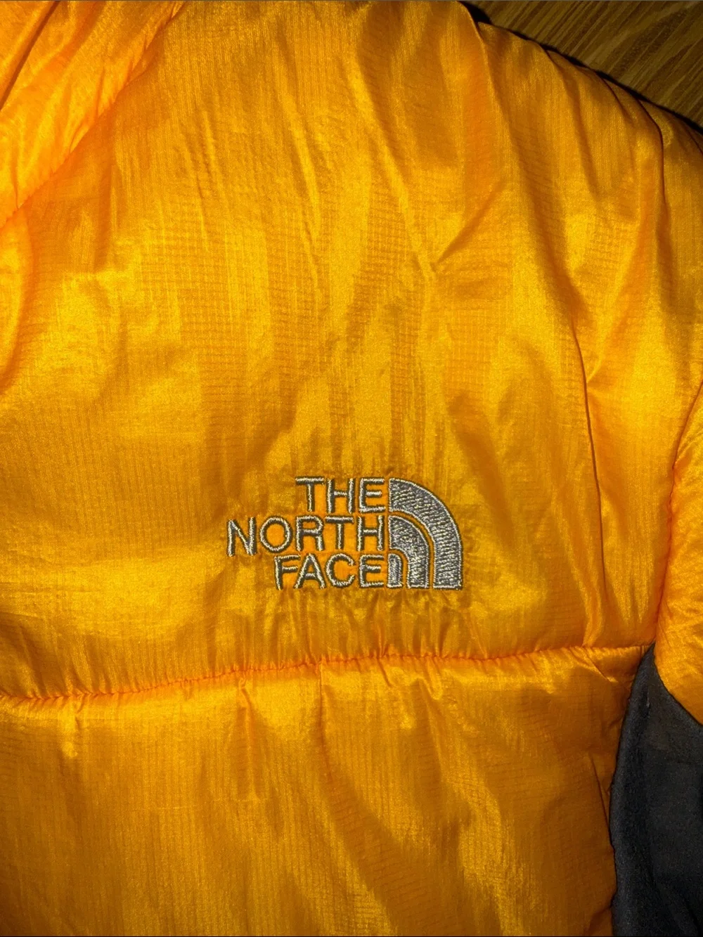 The North Face Men’s Yellow Puffer Jacket with Black Panels size small